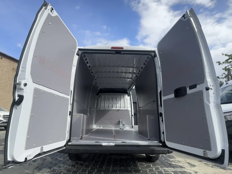 Van fit-out for motorcycle transport