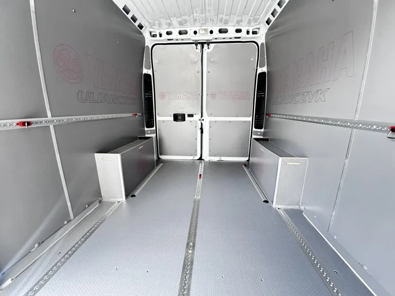 Van fit-out for motorcycle transport