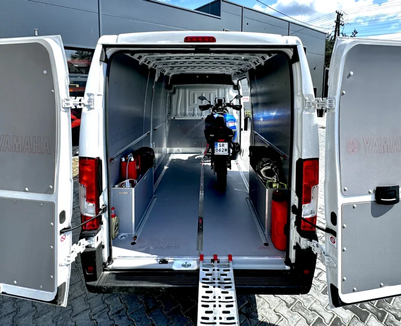 Van fit-out for motorcycle transport