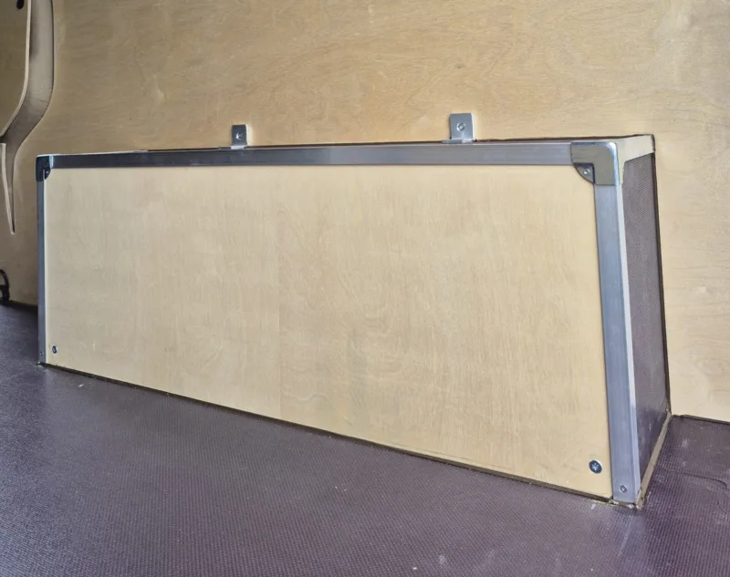 Wheel arch covers with metal fittings