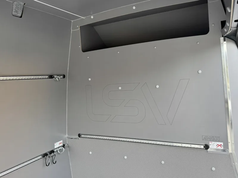 Over-cab space and bulkhead fit-out