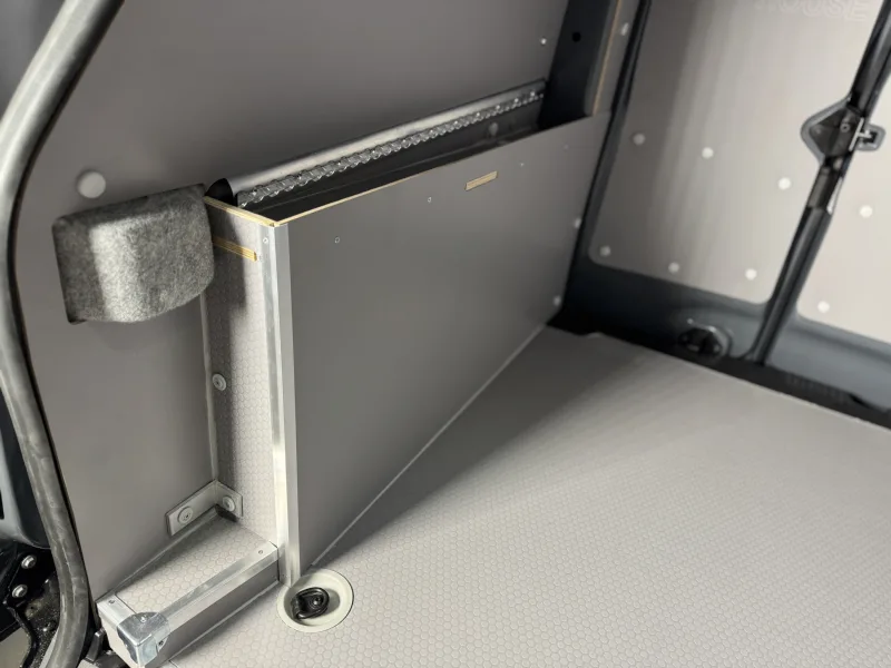 Enlarged wheel arch covers with extra storage compartments