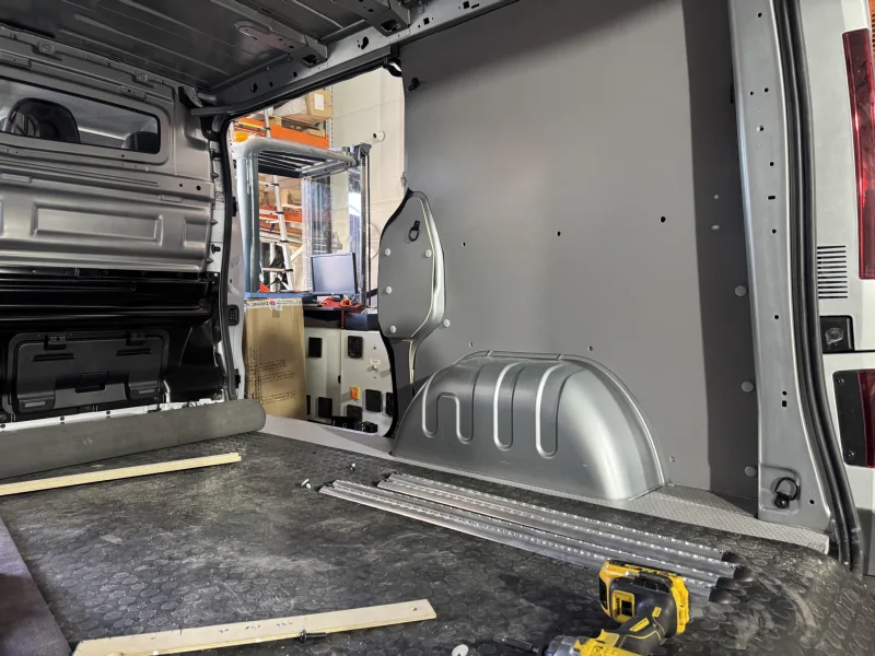 Cargo area fit-out for motorcycle transport